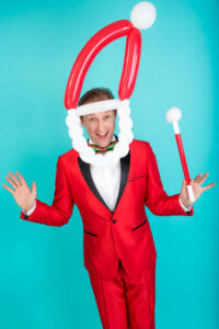 Christmas magician and balloon modeller in London